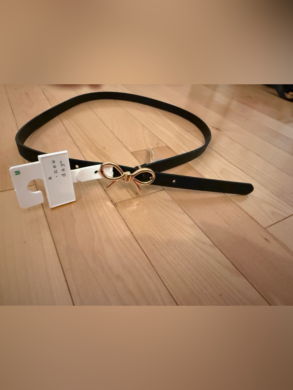 A New Day Gold Bow Black Belt